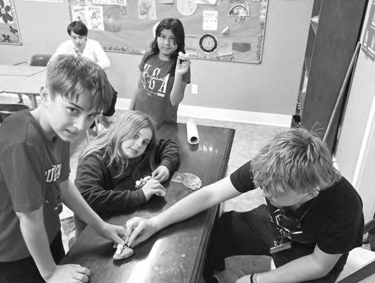 B&G MEMBERS WORK ON PET ROCKS