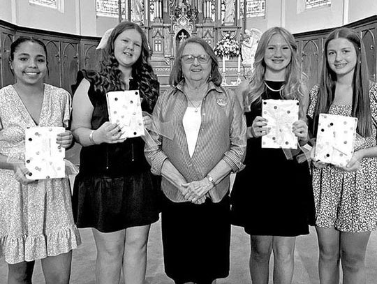 BIBLES PRESENTED TO 8TH GRADERS
