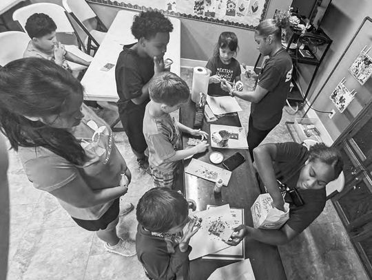 BOYS AND GIRLS CLUB LEARNING SEA MAMMALS