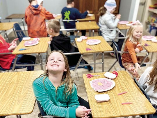 BOYS AND GIRLS CLUB MEMBERS MAKE CRAFTS IN THE NEW YEAR