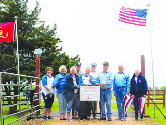 Children of the American Revolution choose the flag display of the month