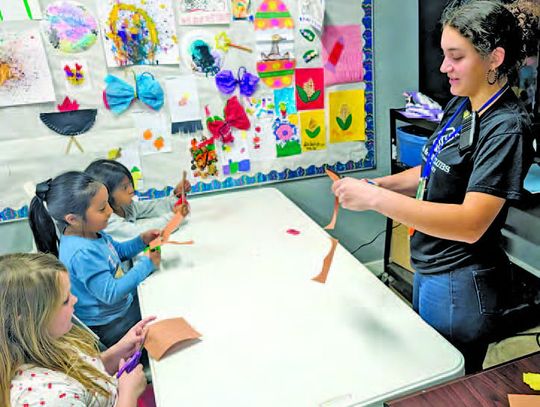 CLUB MEMBERS WORK ON TURKEY CRAFT