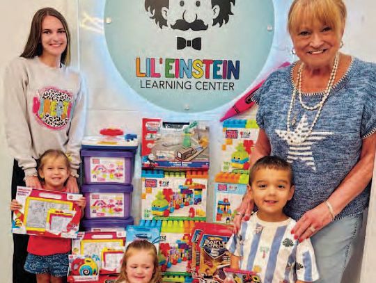 Club shares donated toys with learning center