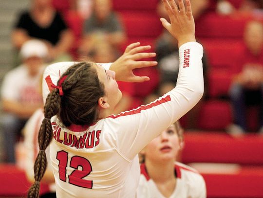 Gracie Schobel tracking the ball and hitting it back over the net. Citizen | Trenton Whiting