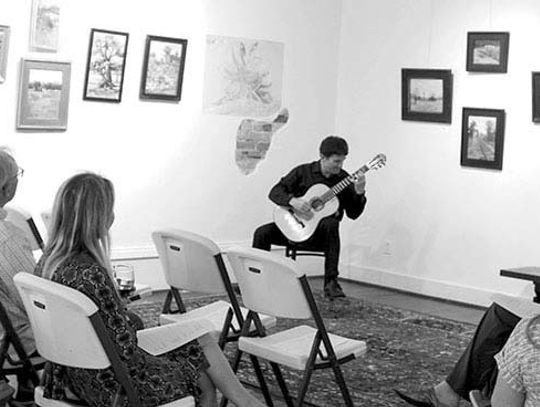 Community attends classical guitar recital at LOAC