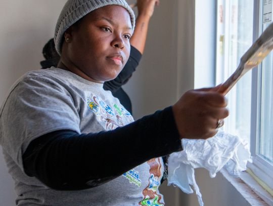 Community celebrates MLK Day by painting Habitat for Humanity home