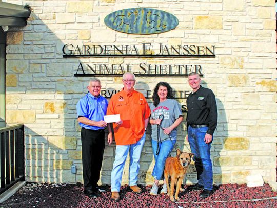 Fayette Electric Cooperative, Colorado Valley Communications celebrate national co-op month with donation