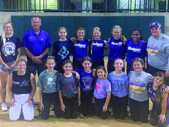 Future Ladycat softballers get training from varsity staff