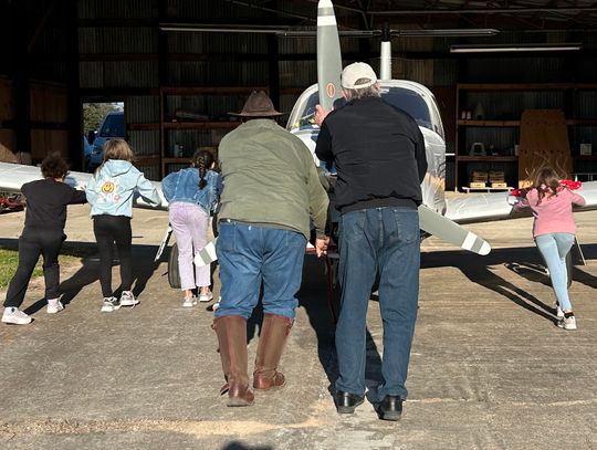 GirlFriends group visits local airport