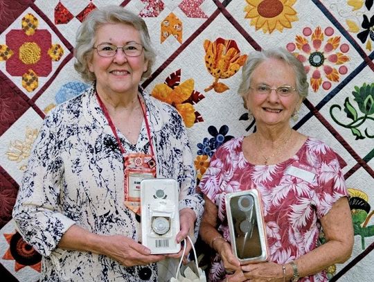 Guild honors two for work with the club