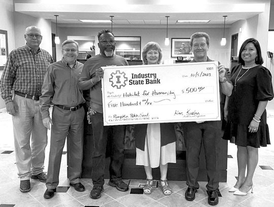 INDUSTRY STATE BANK DONATES TO HABITAT FOR HUMANITY