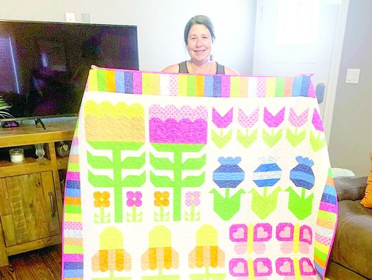 KANA WINS RAFFLE QUILT