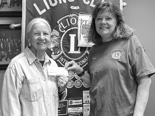 LIONS CLUB DONATES TO LIBRARY