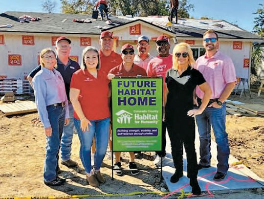Lions in action: Service, community come together to build a roof for Habitat Home