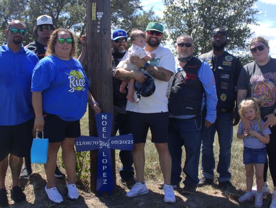 Noel Lopez celebrated by family members