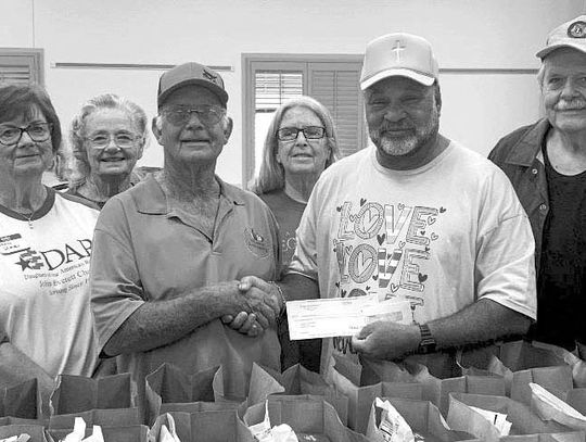 ST. JOHN’S EPISCOPAL DONATES $2,000 TO COLUMBUS FOOD PANTRY