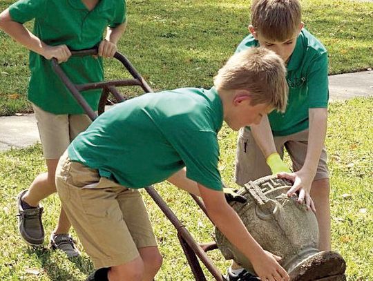 ST. MICHAEL SERVES COMMUNITY WITH YARD WORK