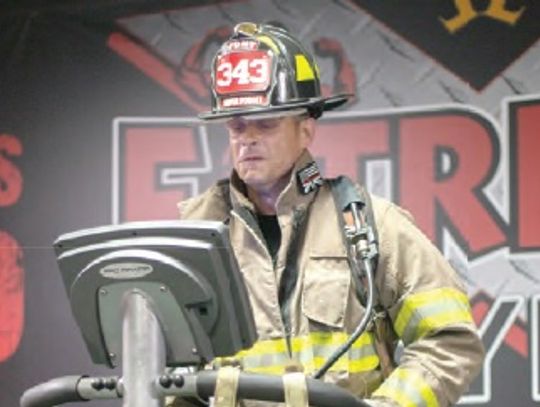 Visiting firefighter climbs 110 flights to honor 9/11 fallen brethren