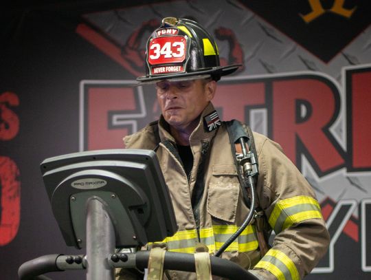 Visiting firefighter climbs 110 flights to honor 9/11 fallen brethren