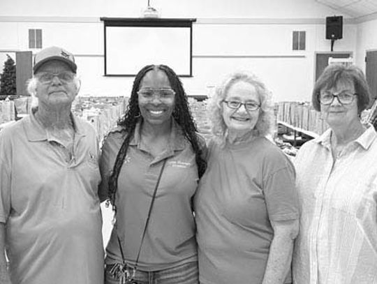 Walmart staff volunteers with the Columbus Food Pantry