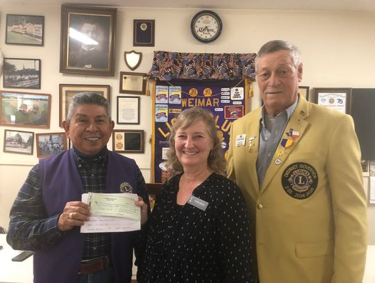 Pictured from left are Joe Jimenez, Ms. Hendricks and 1st District Vice Governor Julius Bartek.  