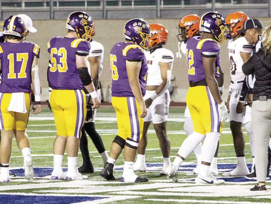 Coin toss to get this Weimar Wildcats vs Refugio Bobcats. From left, seniors no. 17 Wyatt Lacina, no. 63 Weston Pavlik, no. 76 Emmanuel Gaytan, no. 12 Dreylon McMillian. Citizen | Colleen Garcia