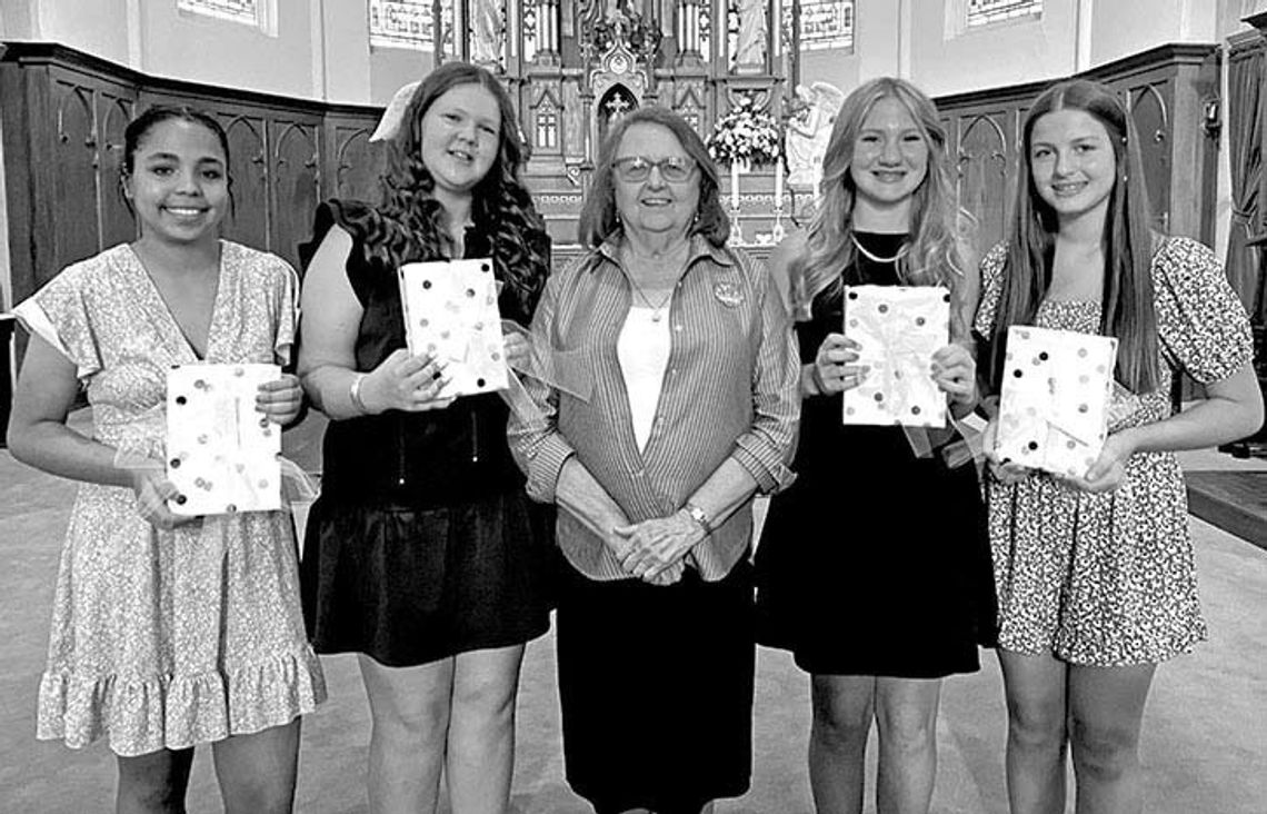 BIBLES PRESENTED TO 8TH GRADERS