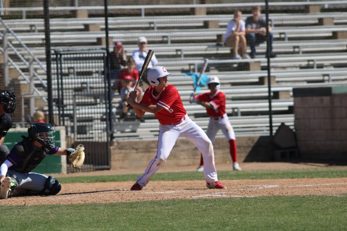 Cards split their last two games