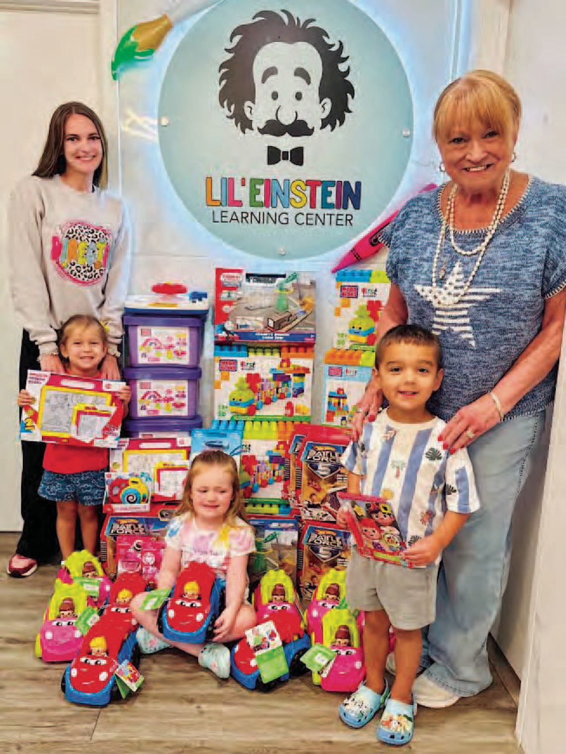Club shares donated toys with learning center Club shares donated toys with learning center