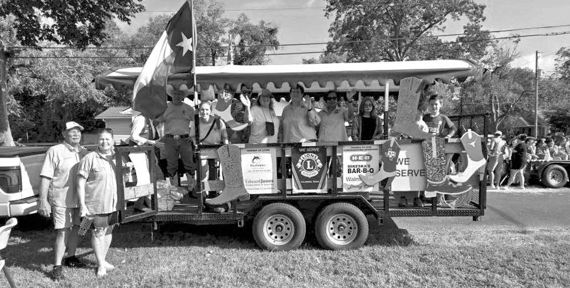 COLUMBUS LIONS INDUCT NEW MEMBER, PLACE SECOND IN COUNTY FAIR PARADE