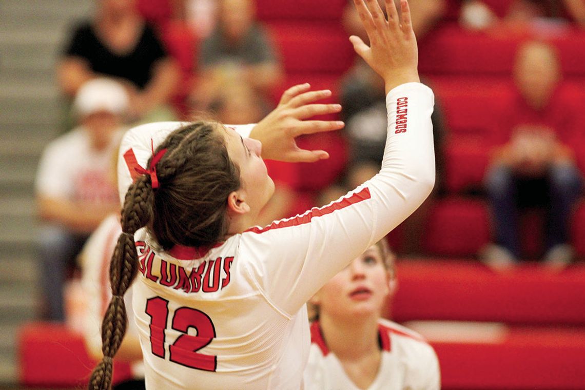 Gracie Schobel tracking the ball and hitting it back over the net. Citizen | Trenton Whiting