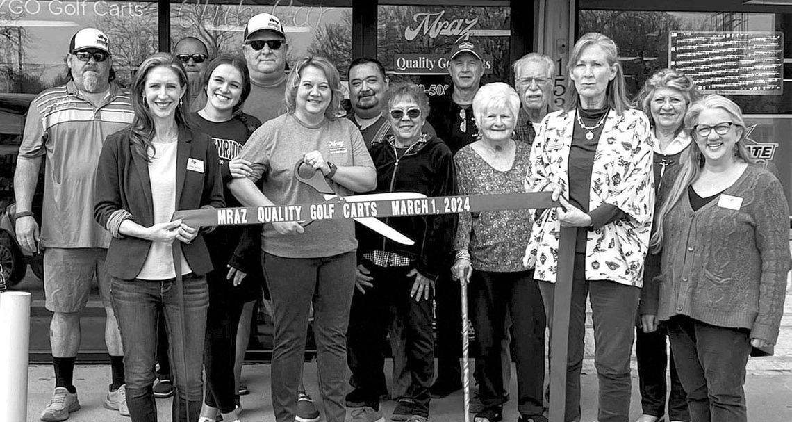 CUSTOM GOLF CART SHOP CUTS RIBBON FOR GRAND OPENING