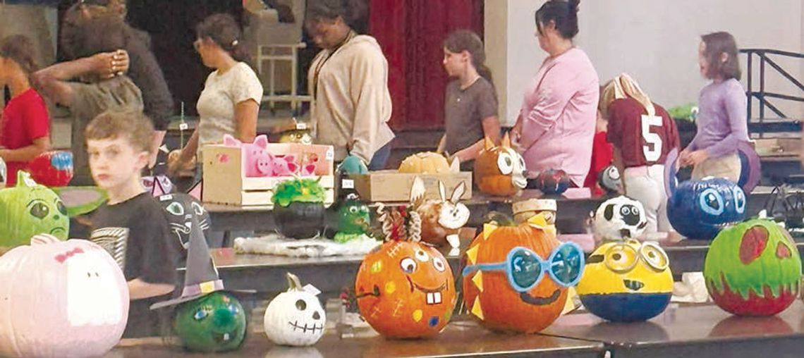 ELEMENTARY STUDENTS SHOWCASE SPOOKY SPIRIT WITH PUMPKIN DECORATING ELEMENTARY STUDENTS SHOWCASE SPOOKY SPIRIT WITH PUMPKIN DECORATING