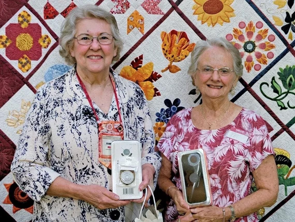 Guild honors two for work with the club Guild honors two for work with the club