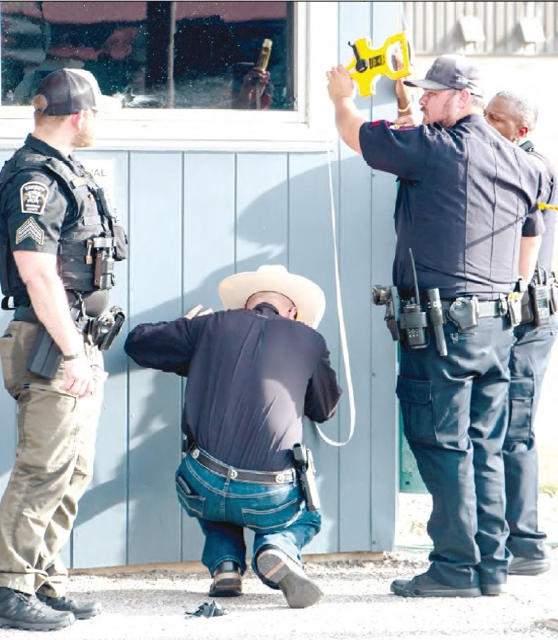 Gunfire outside vet clinic lands one in jail, wounded technician recovering Gunfire outside vet clinic lands one in jail, wounded technician recovering