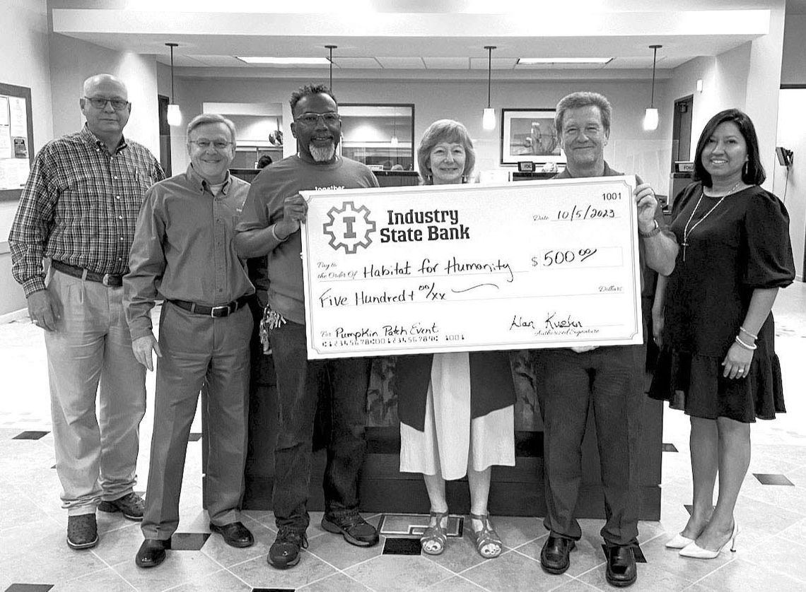 INDUSTRY STATE BANK DONATES TO HABITAT FOR HUMANITY