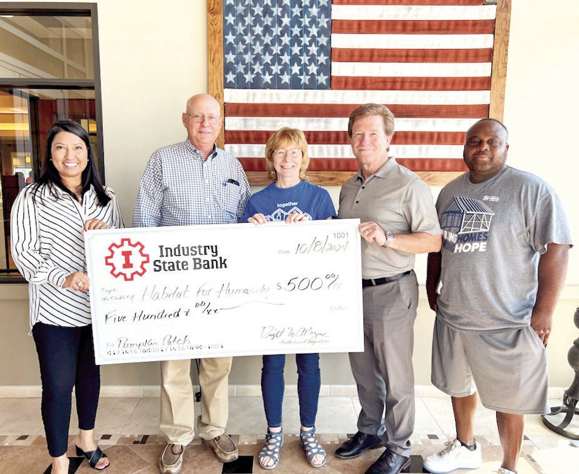 INDUSTRY STATE BANK GIVES $500 TO HABITAT FOR HUMANITY