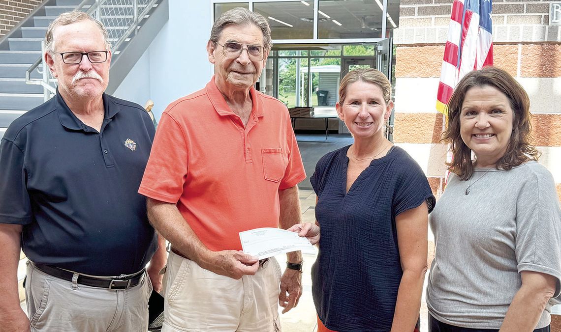 KC DONATES TO SAS ANGEL FUND