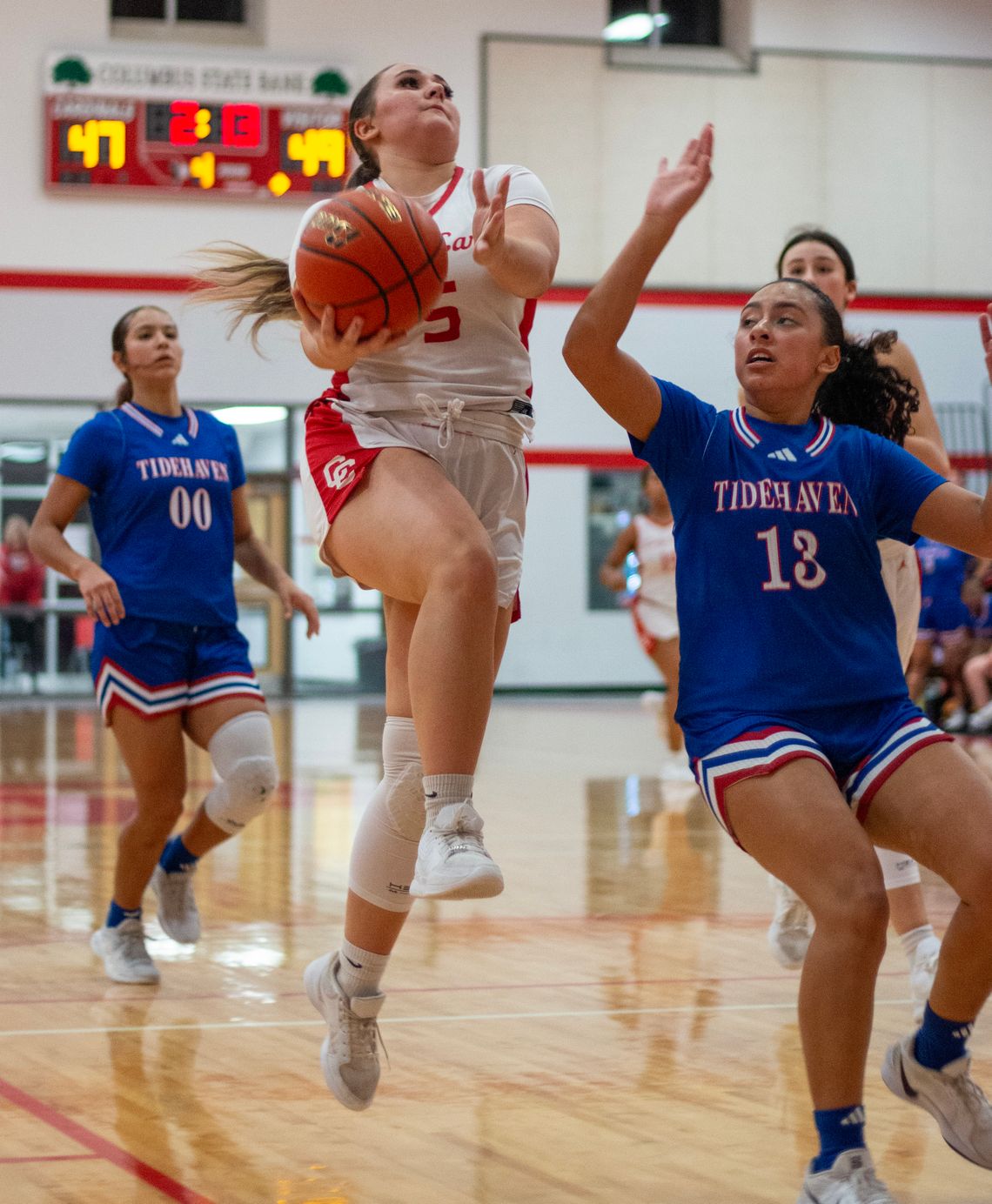 Lady Cards nest atop the district standings