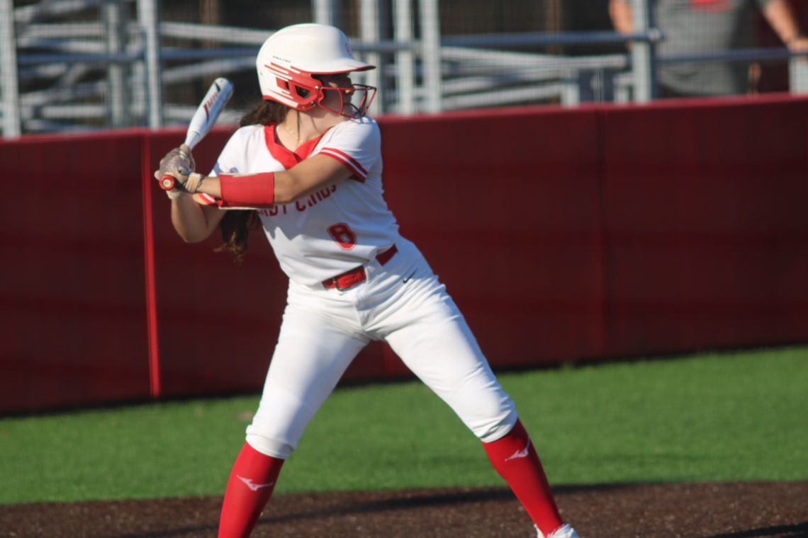 Lady Cards split district games, remain in second place