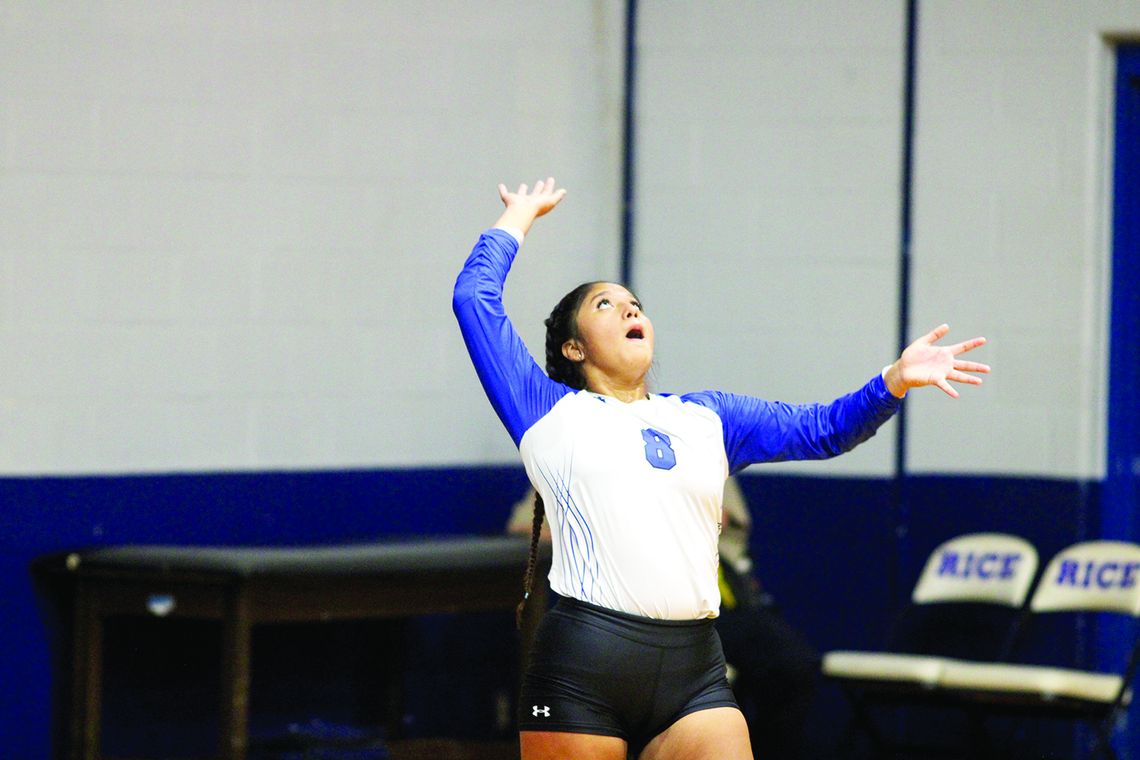 Ariana Palacios prepares to serve during a home game this season. Citizen | Trenton Whiting