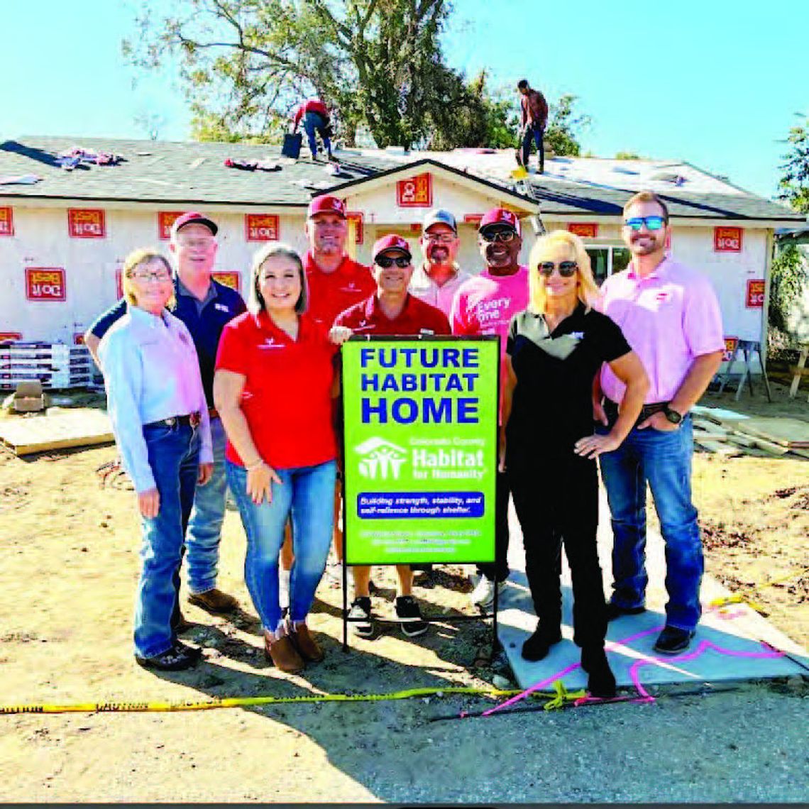 Lions build roof for Habitat home Lions build roof for Habitat home