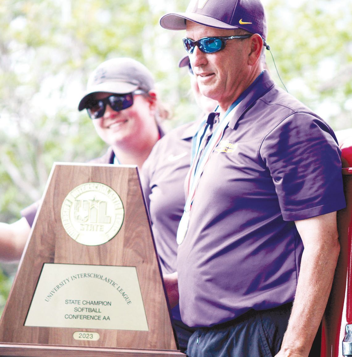 Longtime Weimar softball head coach takes COTY trophy