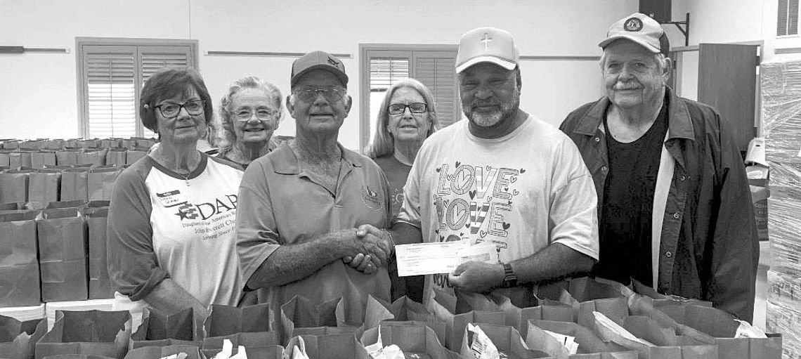 ST. JOHN’S EPISCOPAL DONATES $2,000 TO COLUMBUS FOOD PANTRY