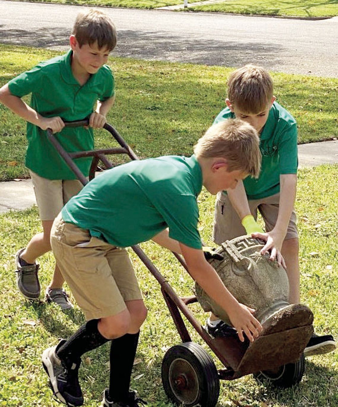 ST. MICHAEL SERVES COMMUNITY WITH YARD WORK