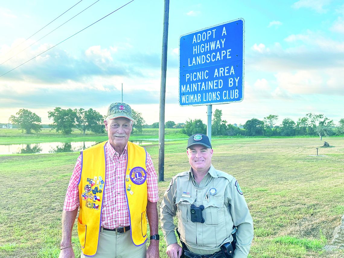 Pictured at Borden Lake are 1st District Vice President Julius Bartek, a Weimar Lion, and Officer Kohleffel. Courtesy photo