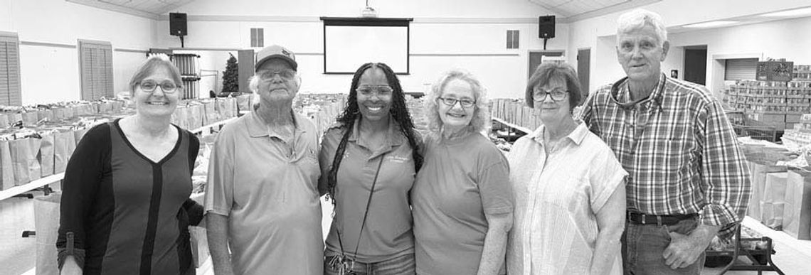 Walmart staff volunteers with the Columbus Food Pantry