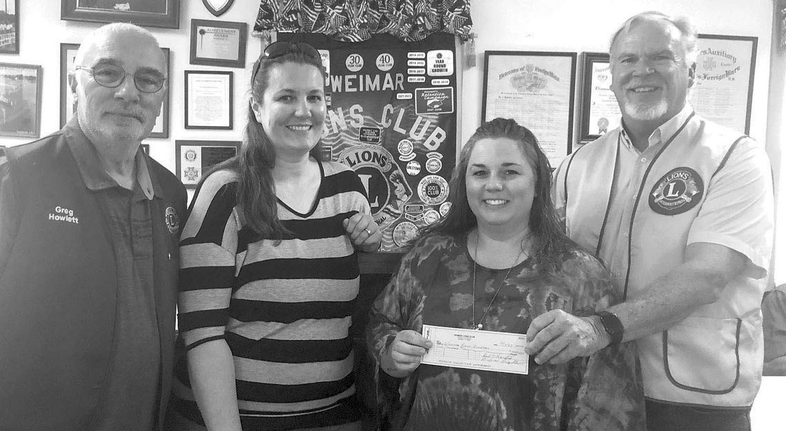 WEIMAR BAND GETS DONATION FROM LIONS