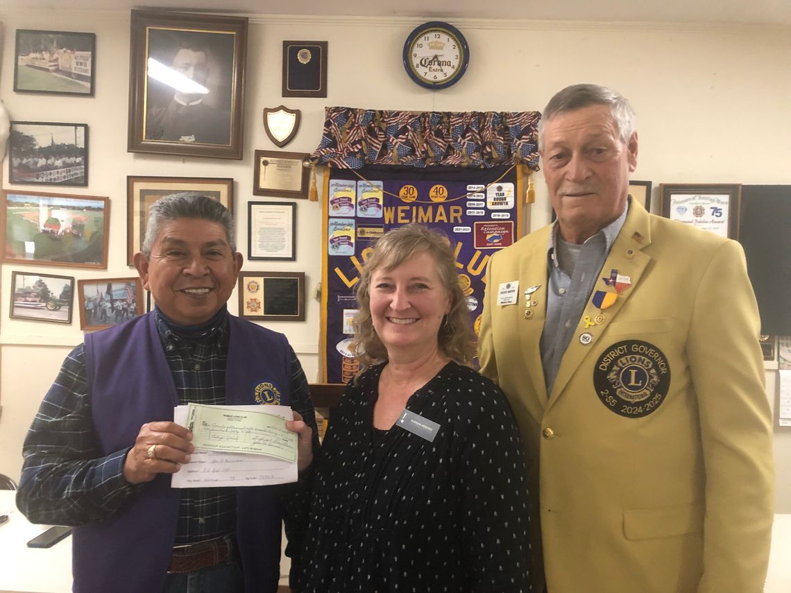 Pictured from left are Joe Jimenez, Ms. Hendricks and 1st District Vice Governor Julius Bartek.  