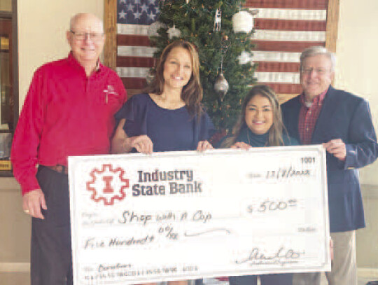 Shop with a Cop (Benefitting Boys &amp; Girls Club of Champion Valley) – Mazac (left), Laura Weido, Yarley Penaloza, and Kuehn.